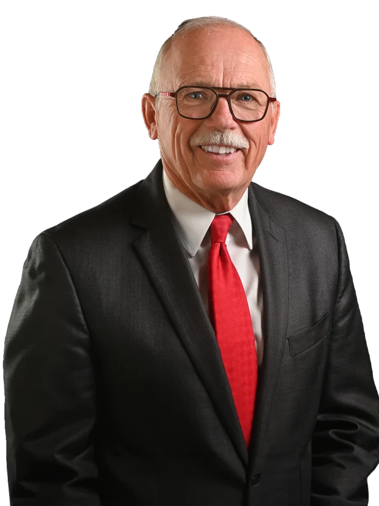 DOUG J. HEINRICKS, KC